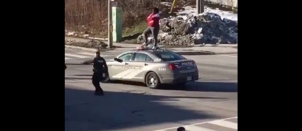 Toronto Lady Goes Crazy On Police Car