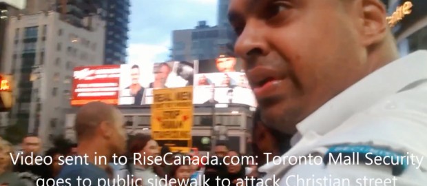 Security Guard Rushes Sidewalk To Stop Preacher From Islam Criticism