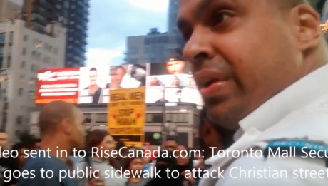 Security Guard Rushes Sidewalk To Stop Preacher From Islam Criticism